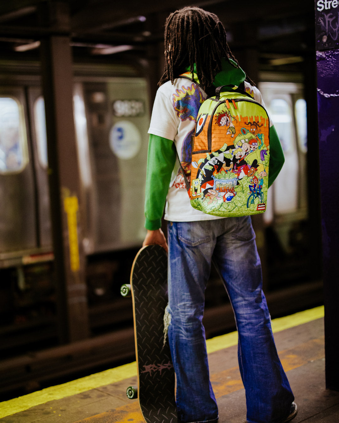 Back view of the Retro Vibes DLXSR Backpack highlighting the ergonomic mesh back padding.