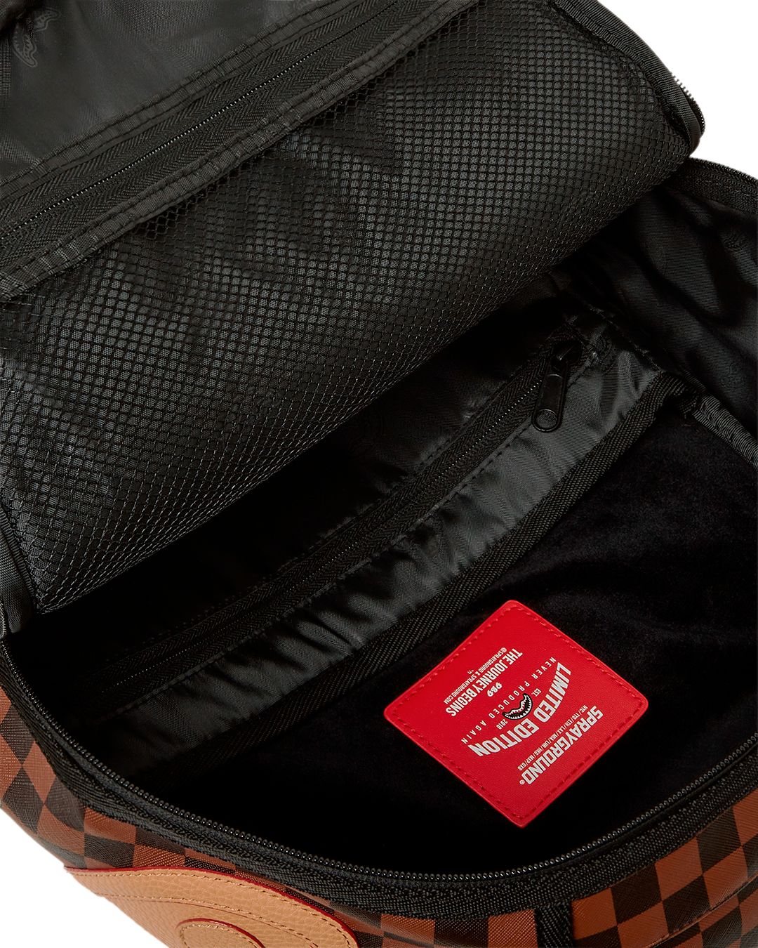 Henny Victory backpack worn over a trench coat in urban setting
