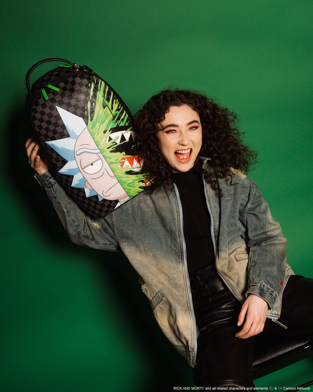 Front view of the Rick & Morty limited edition sprayground backpack with clear exterior