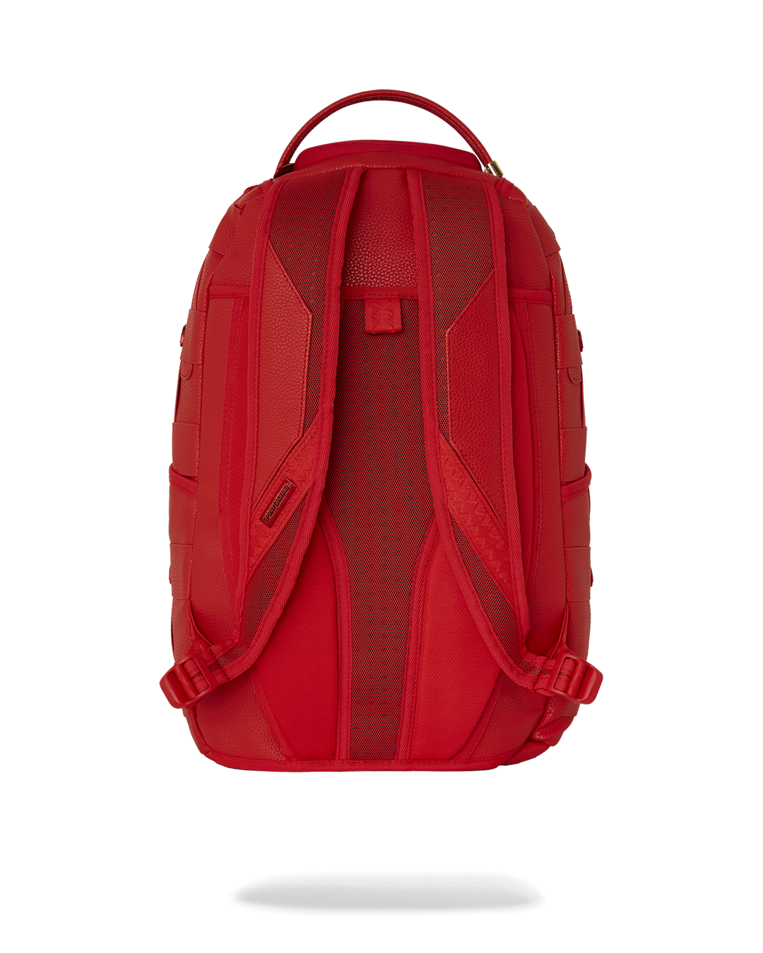 Faux leather backpack worn by a commuter in urban setting