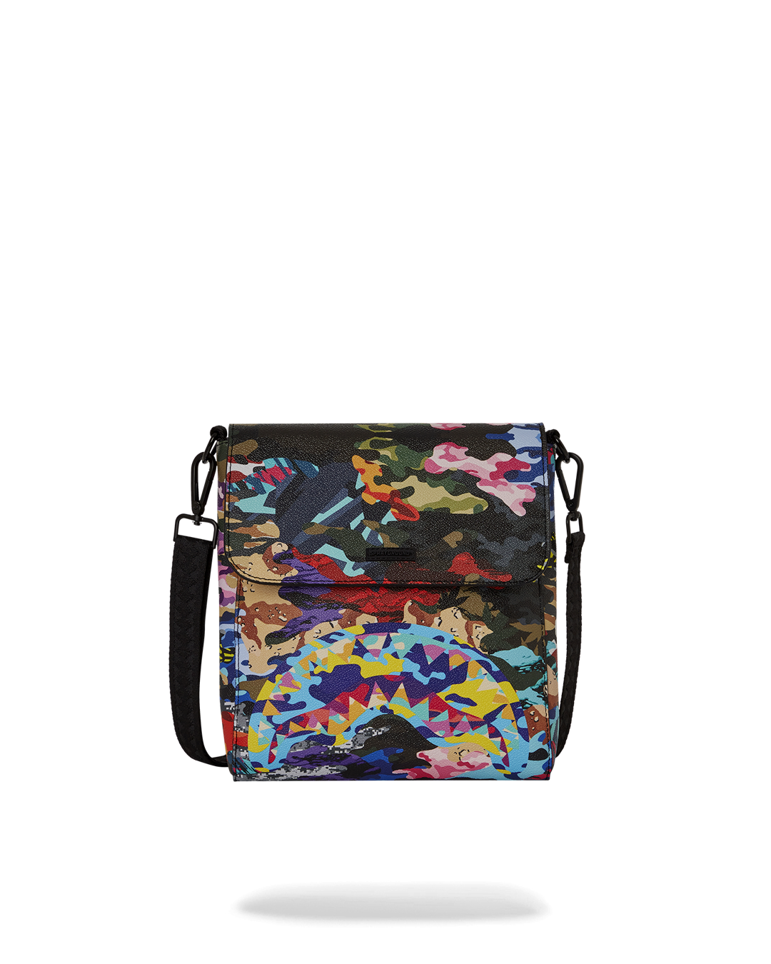 Close-up of camo messenger bag worn crossbody during NYC commute