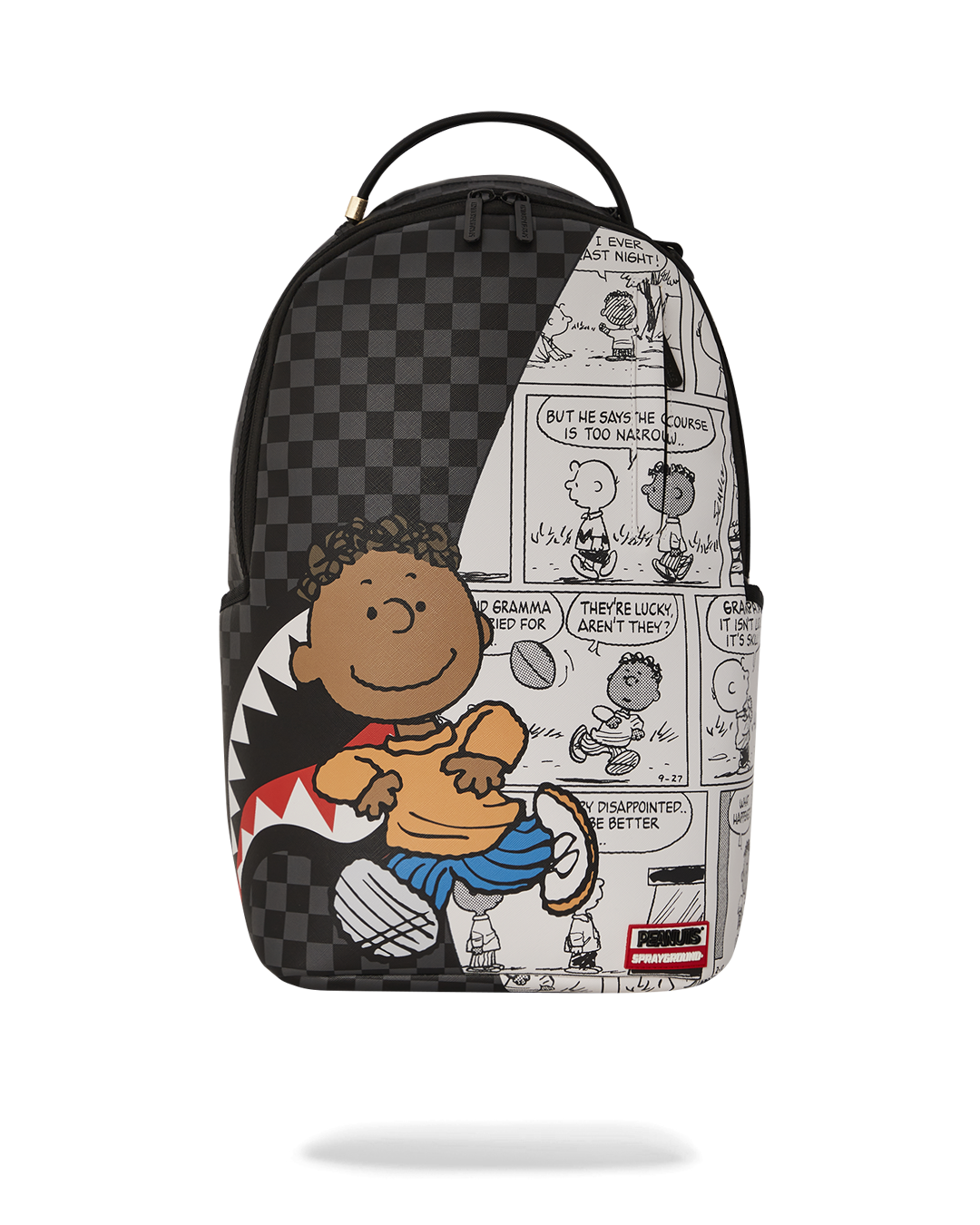 Front view of clear Sprayground backpack with comic shark pattern worn in an urban setting