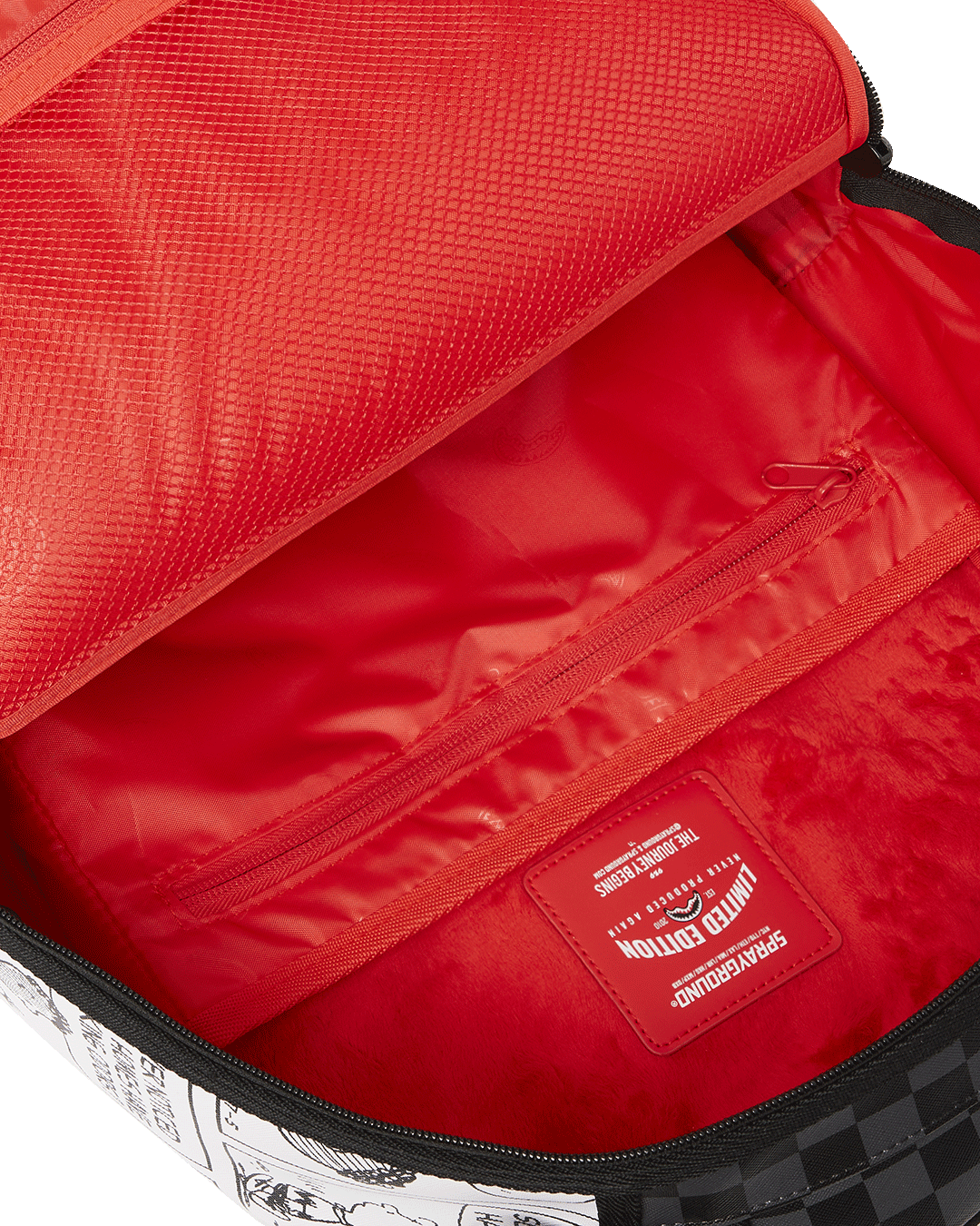 Side angle of the Franklin Sharks faux leather backpack with open pockets.