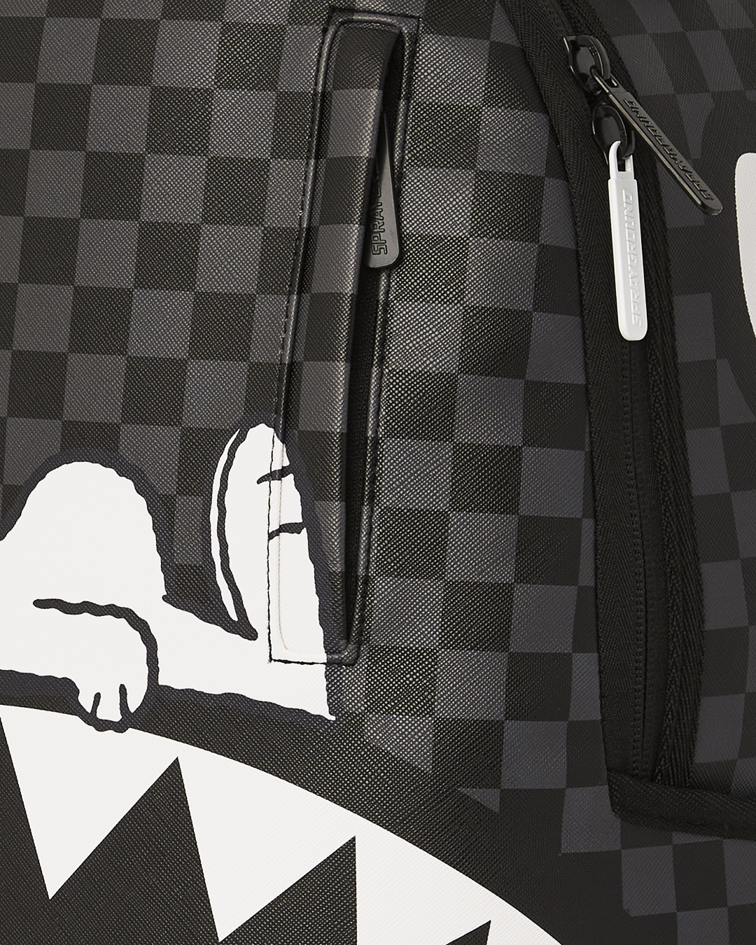 Interior view of the separate velour laptop compartment and mesh organizer pocket
