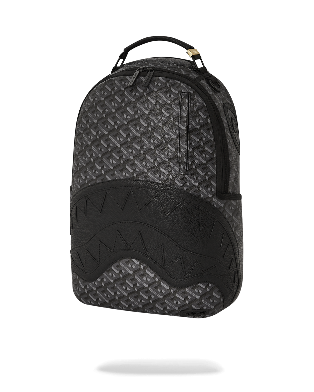 Faux leather backpack with gold zippers and metal hardware, connected to carry-on luggage