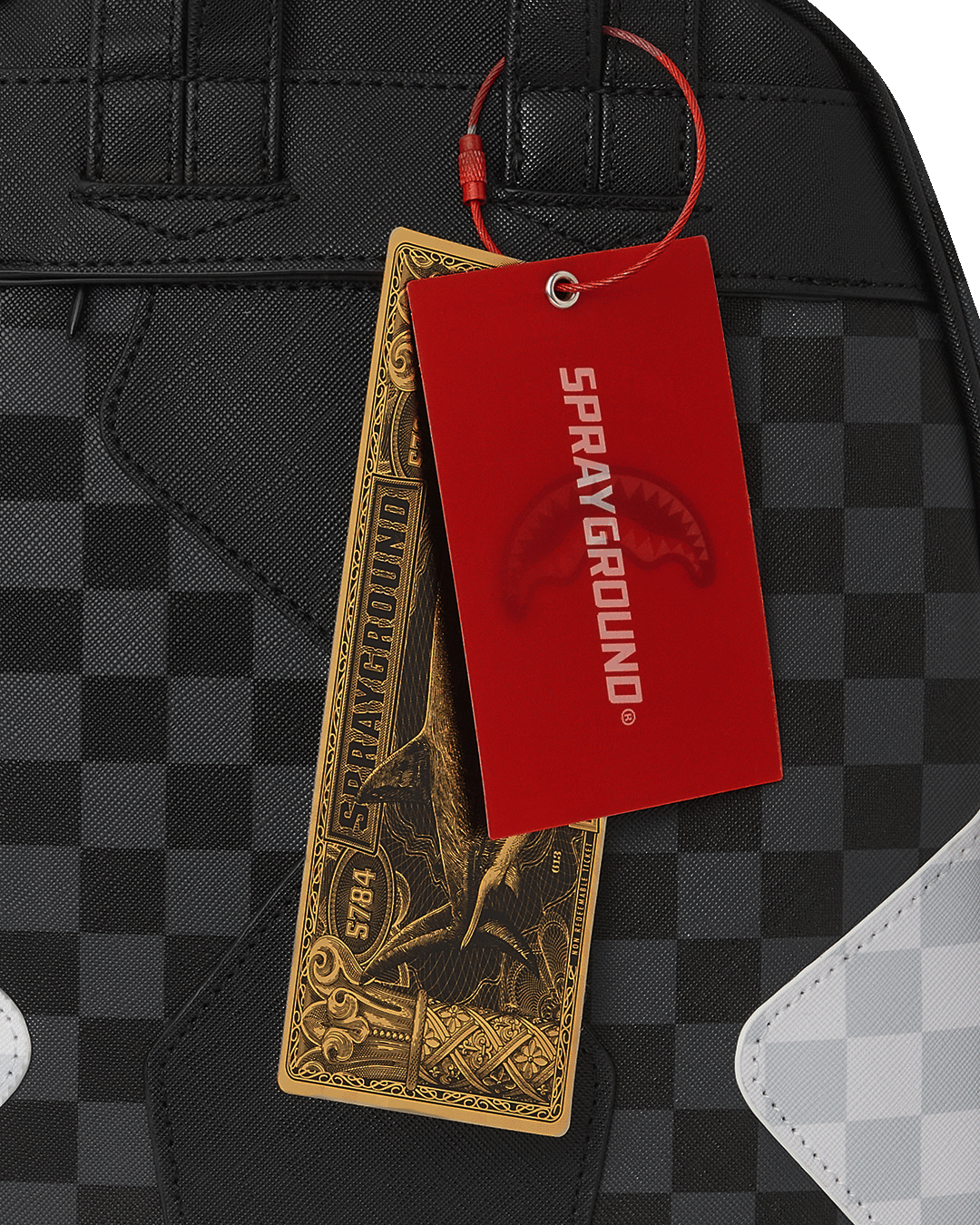 Savage Elite Triple Decker Backpack with gold zippers and side pockets.