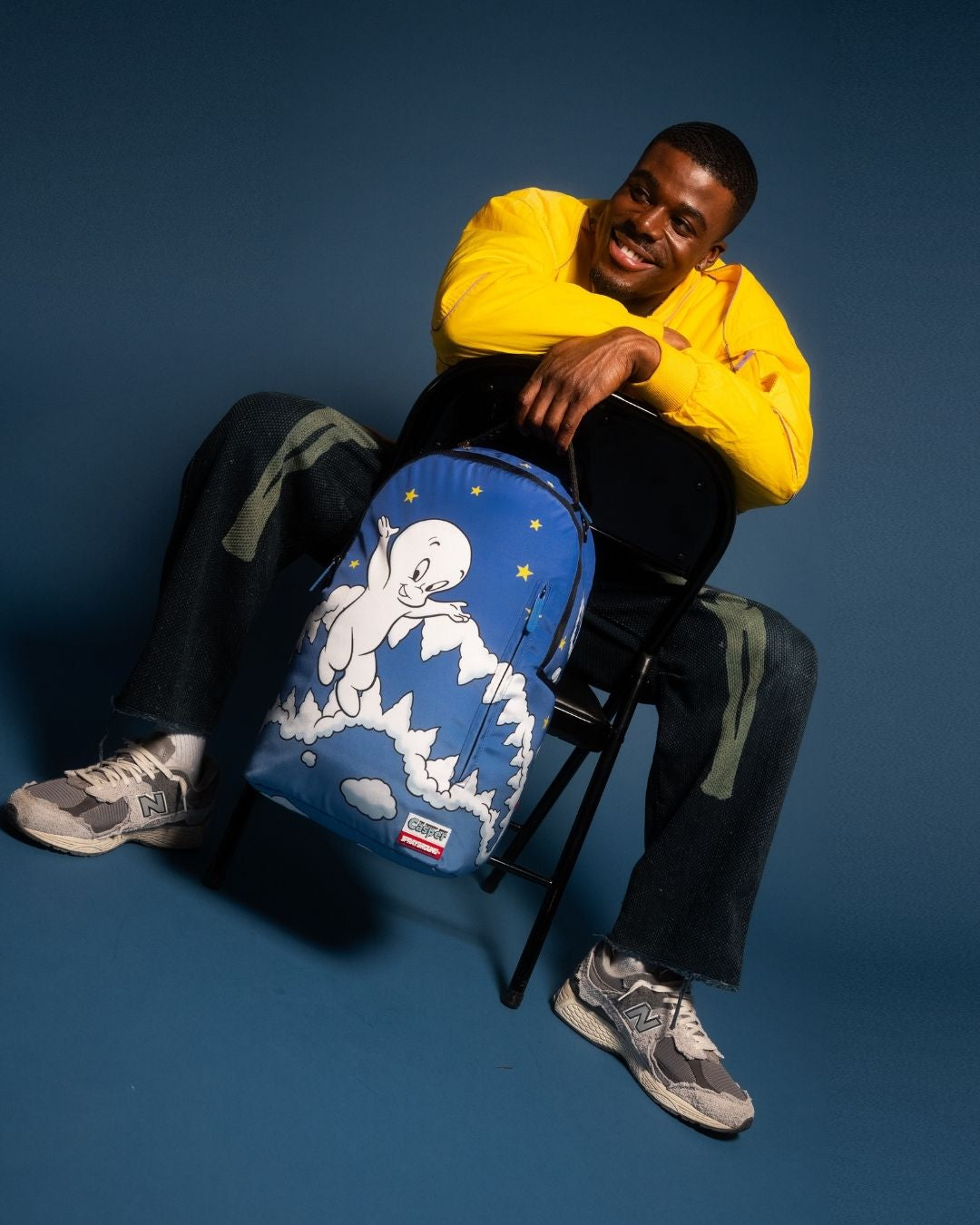 Back sleeve connecting to carry-on luggage for hands-free travel