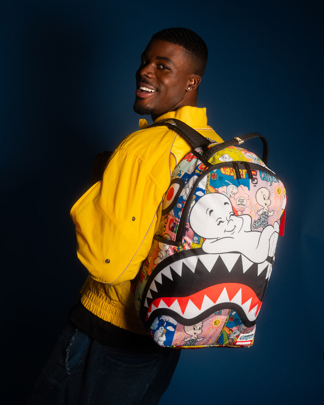 Casper Dreams Deluxe Backpack with gold zippers and ergonomic back padding.