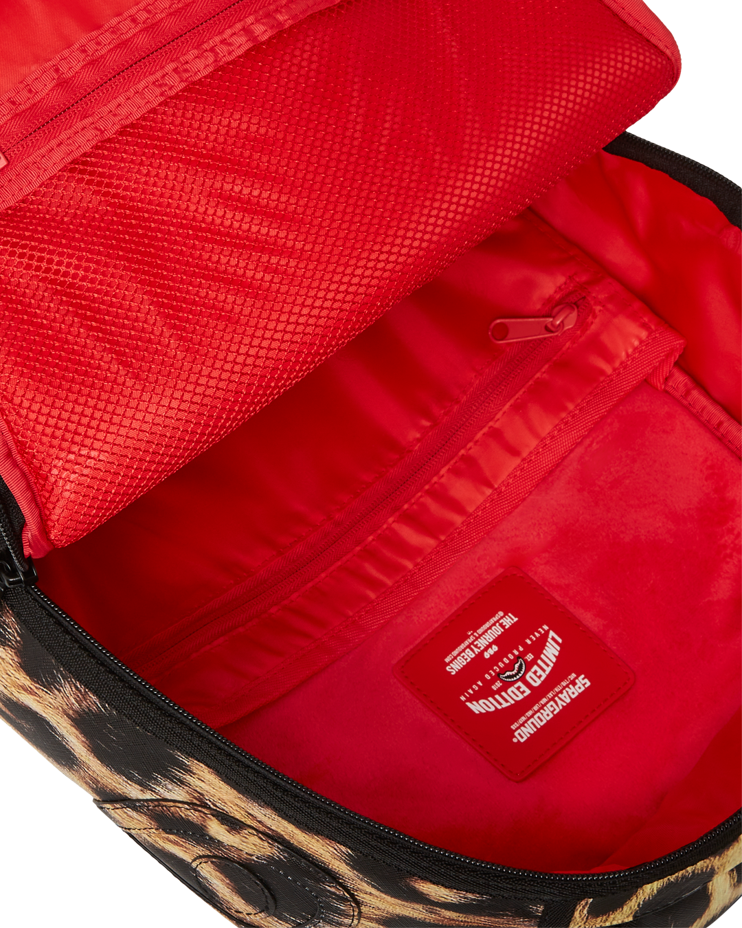 Side view of the backpack with side pockets and ergonomic mesh back padding for comfort