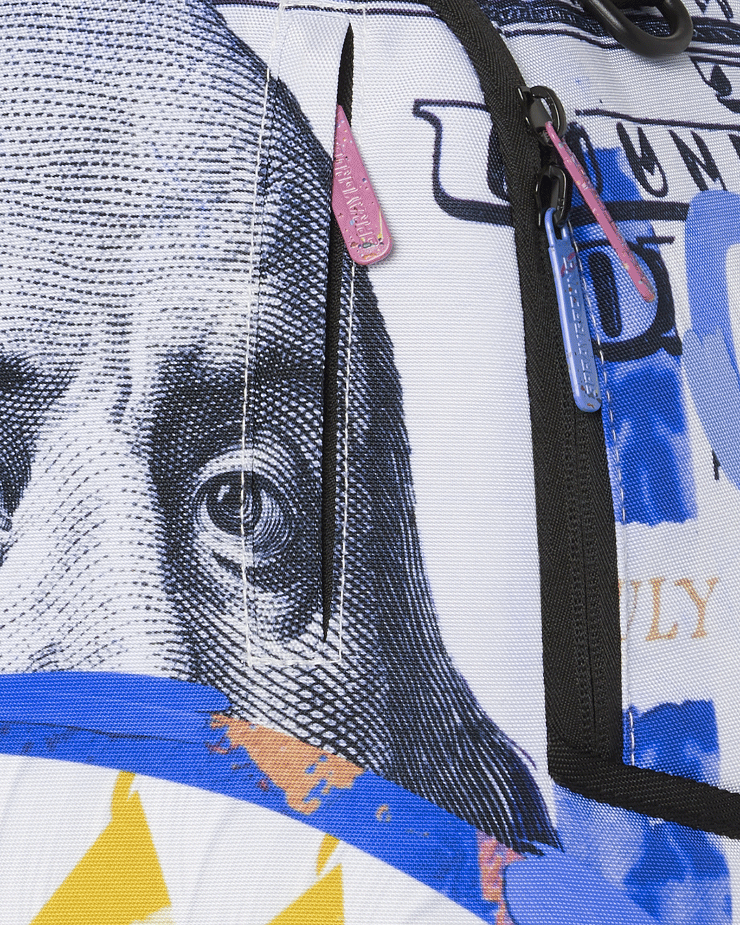 Front view of Sprayground money-print backpack with zippered pockets