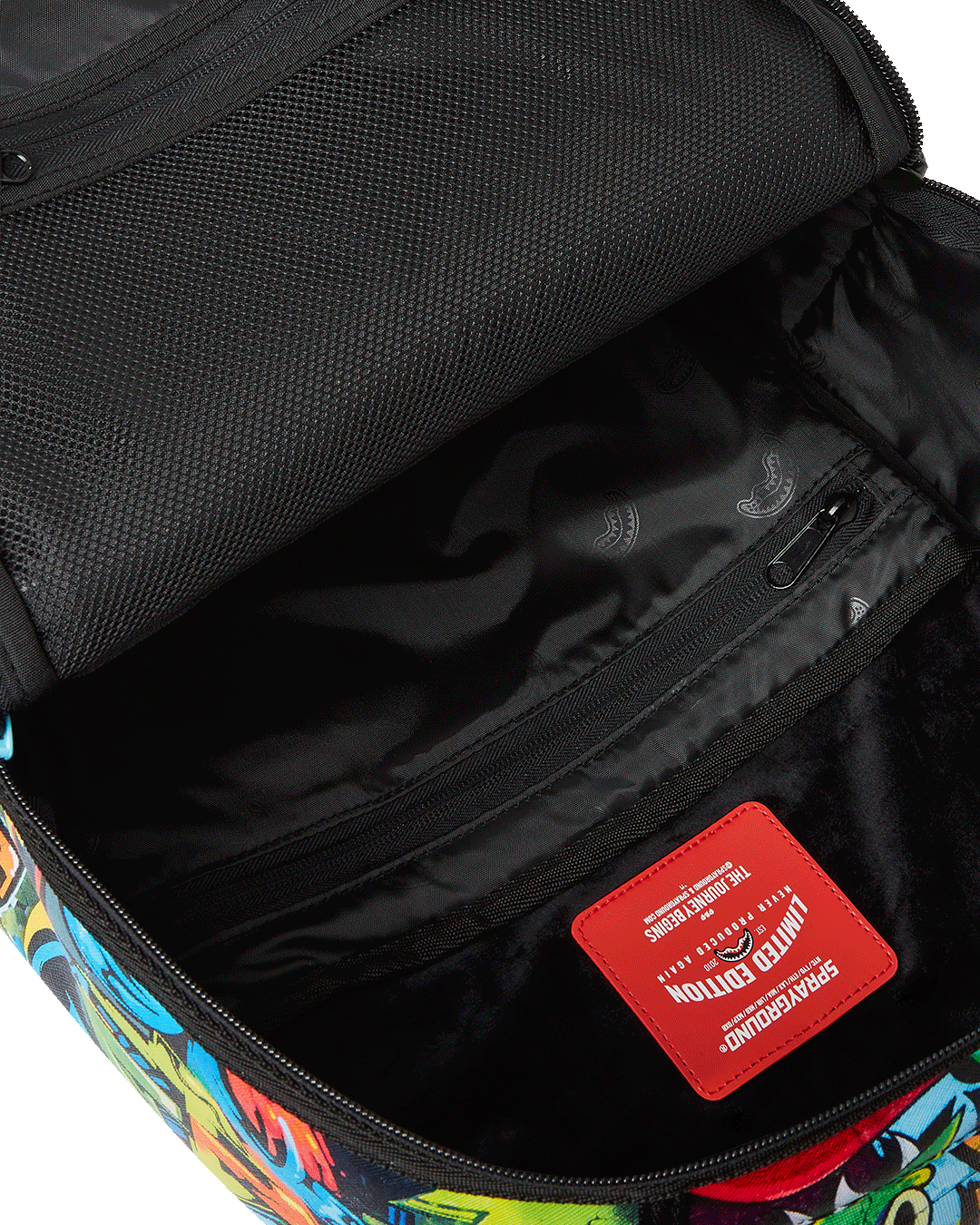 Interior shot of velour-lined compartments and laptop sleeve for secure organization