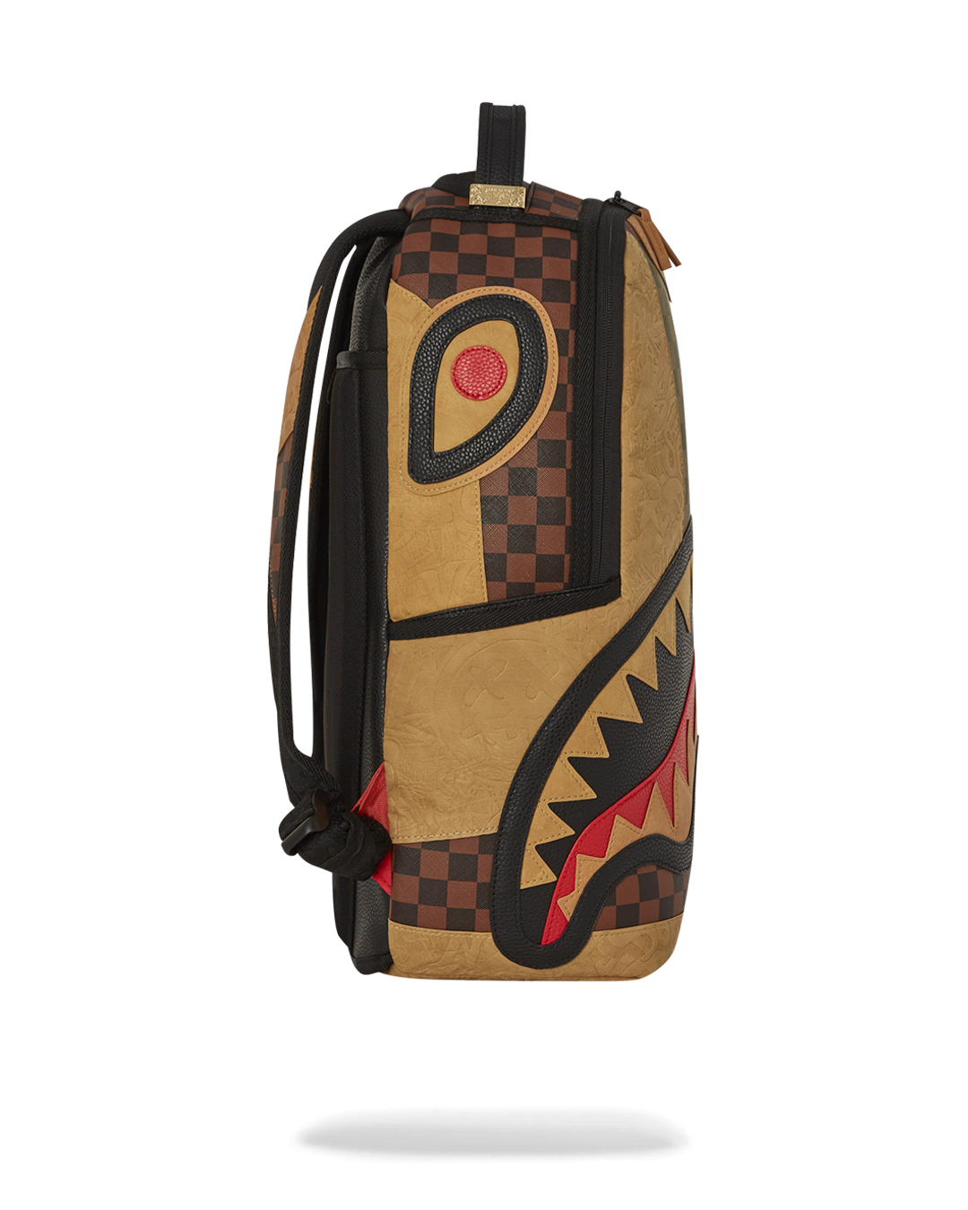 Close-up of the backpack’s zippered compartments and laptop sleeve
