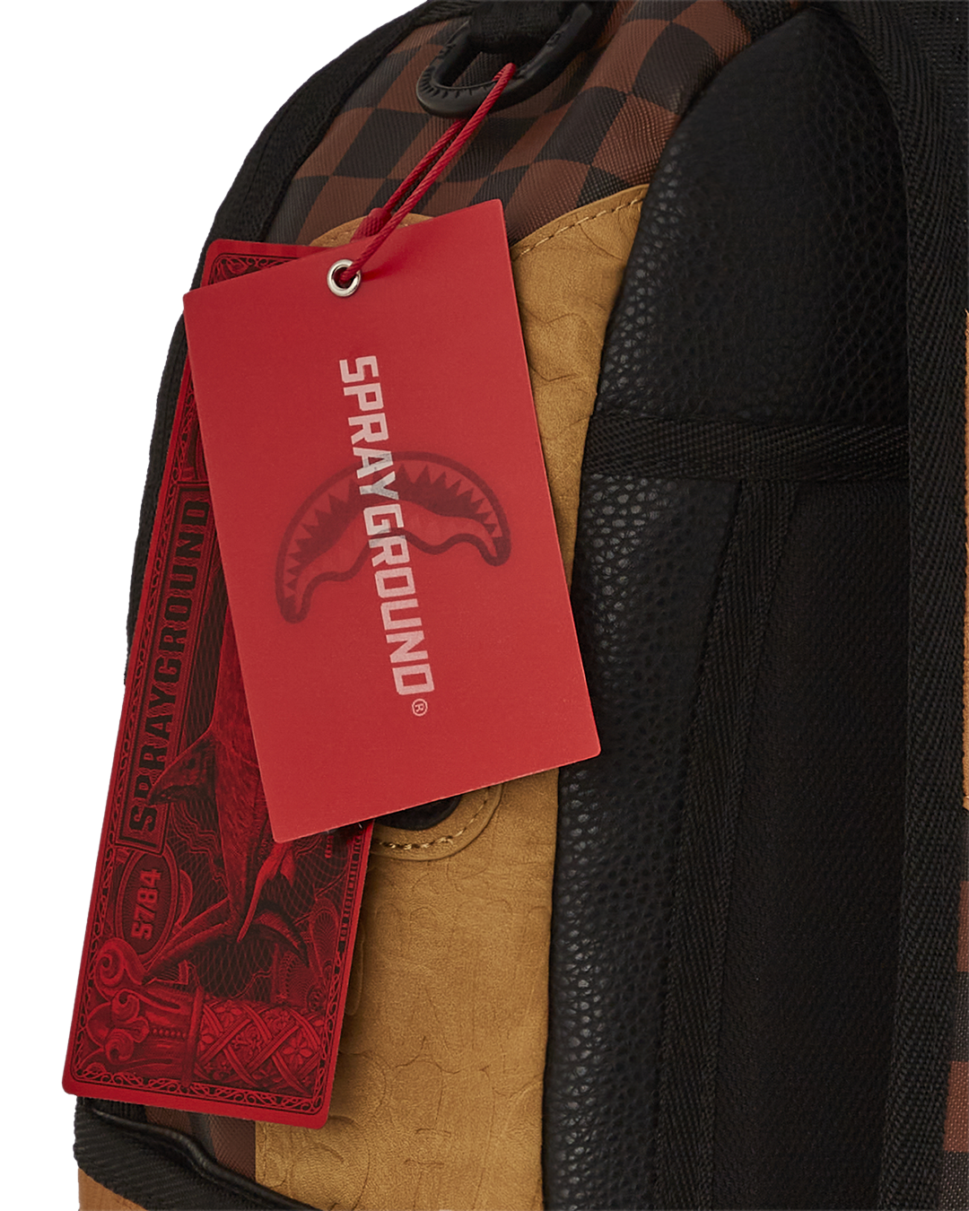Henny Hercules faux leather backpack shown on a woman traveling through an urban setting