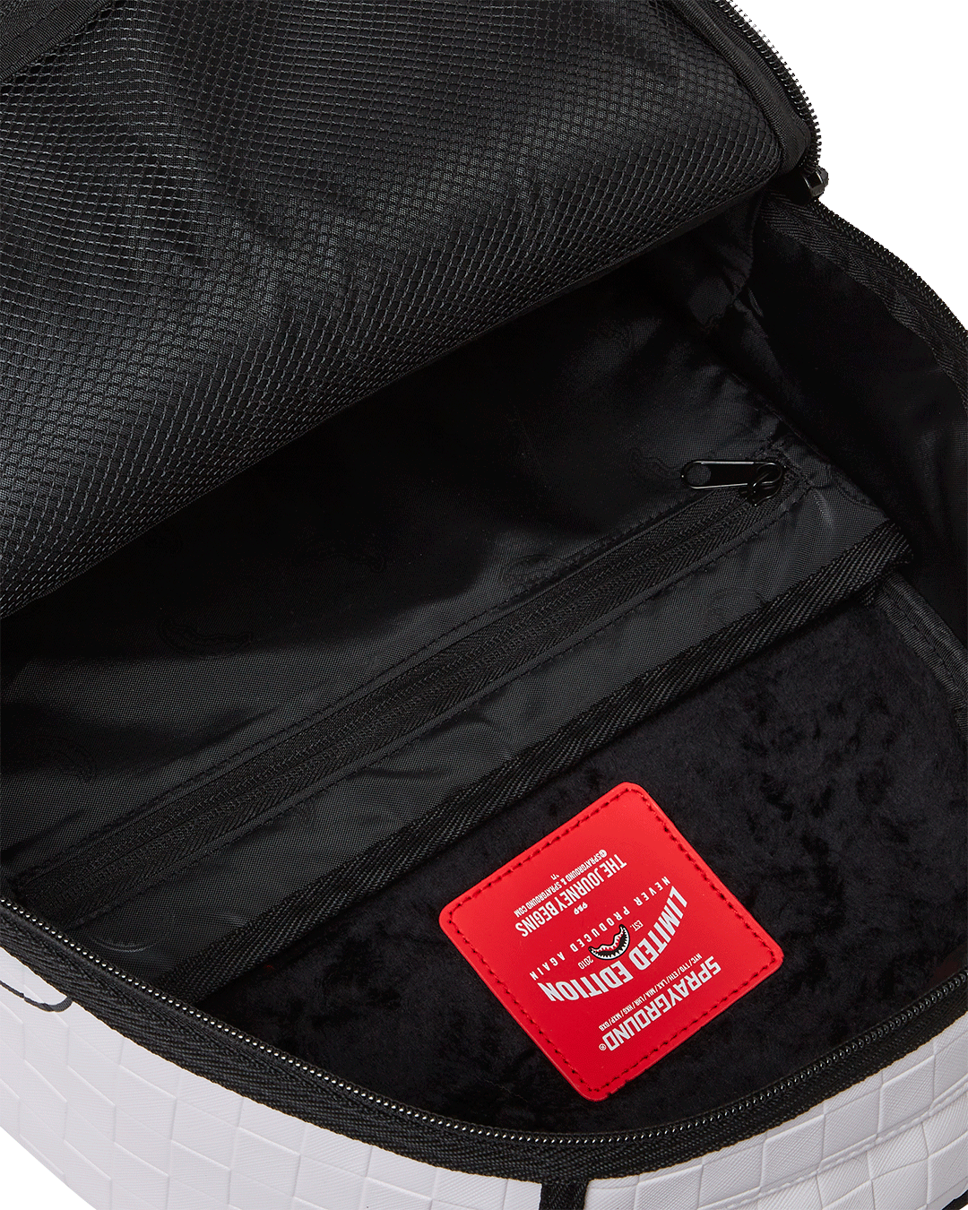 Side view highlighting side pockets and sunglass compartment