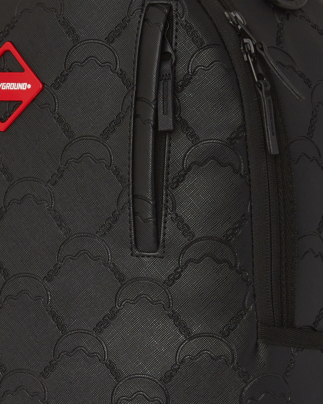 Interior view showing the padded laptop compartment inside the designer backpack