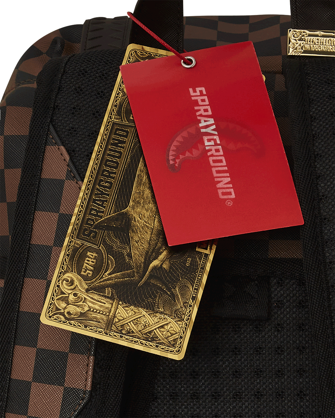 Backside of backpack showing slide-through luggage sleeve and mesh padding