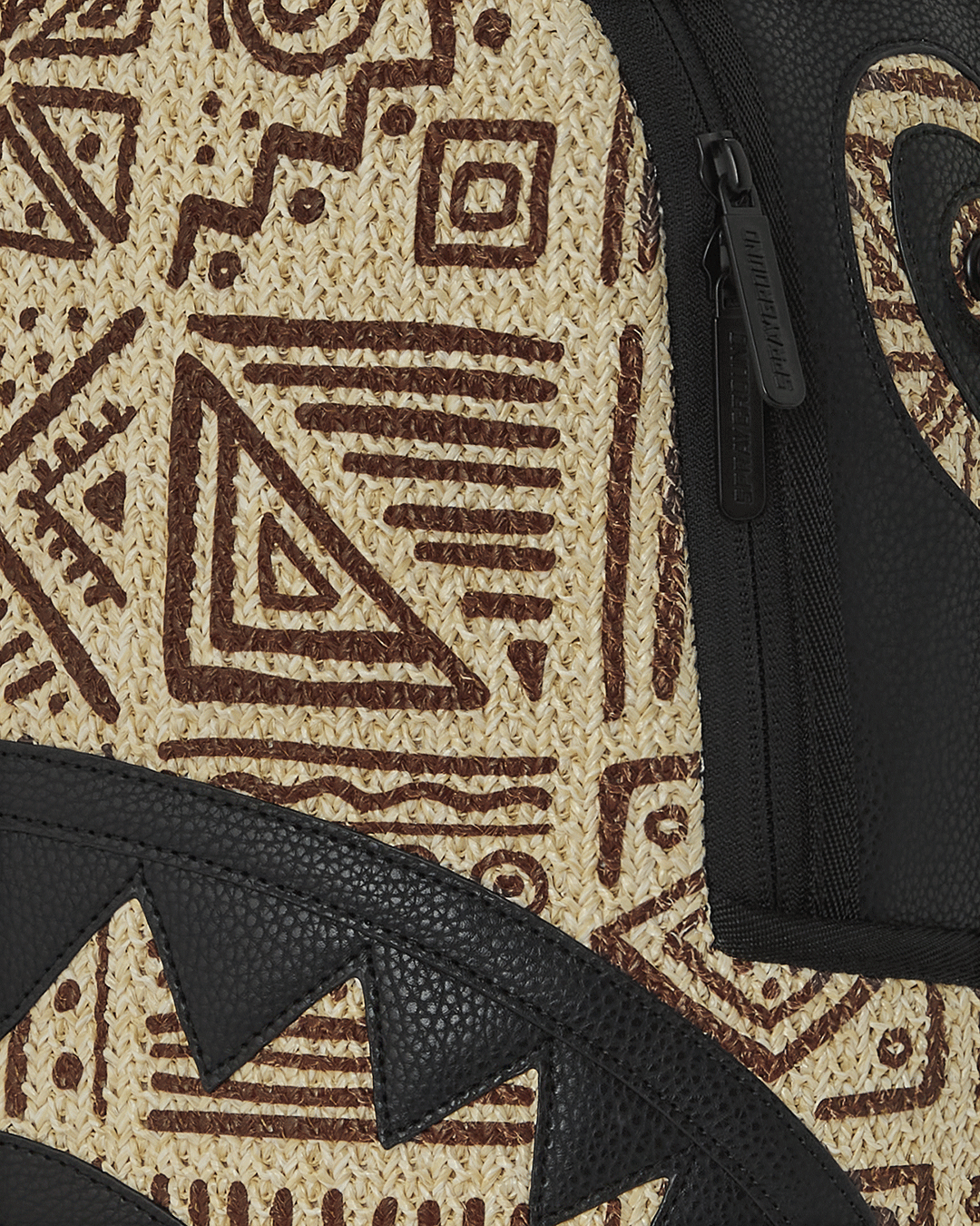 Sprayground African Intelligence backpack side view showing ergonomic mesh back padding