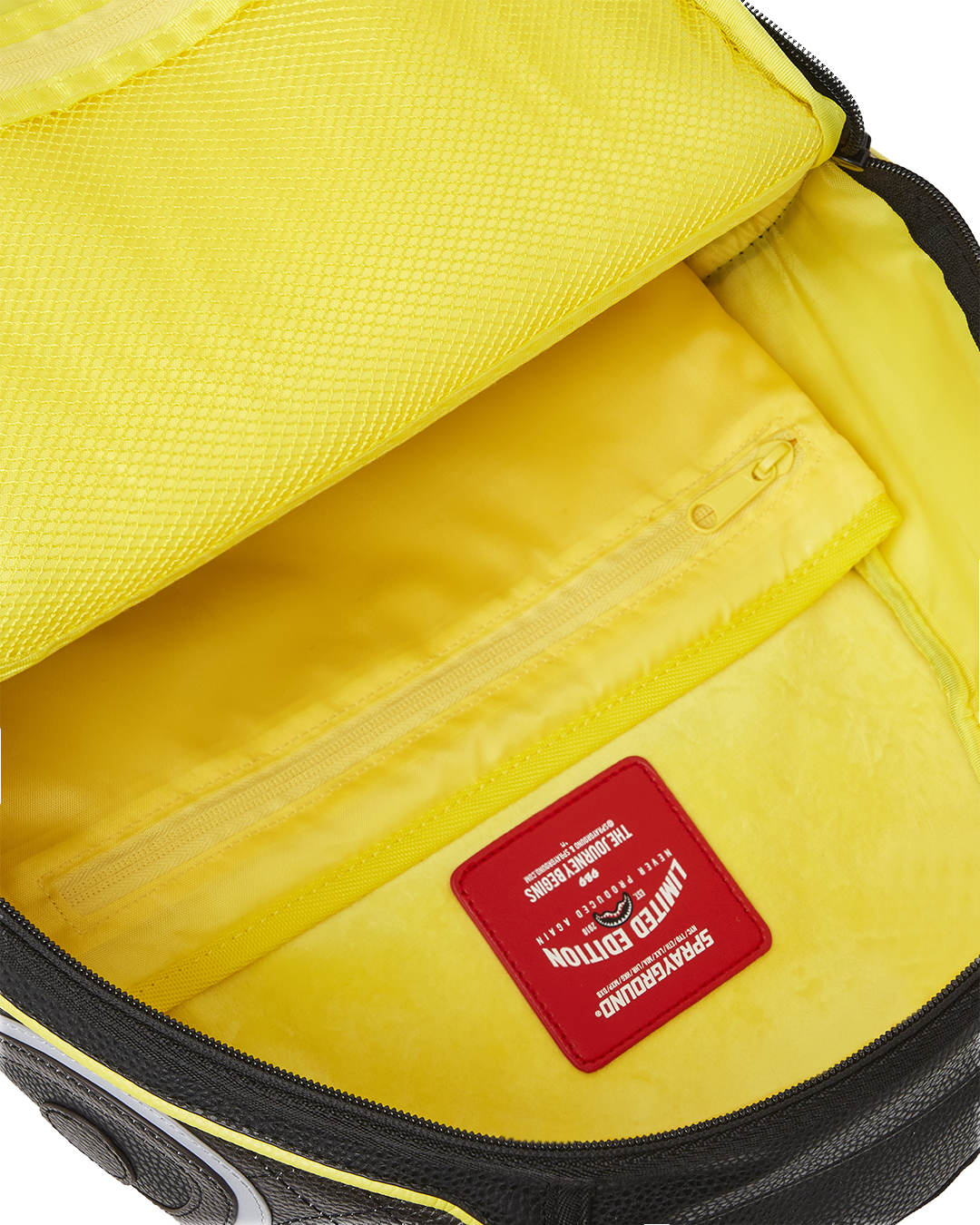 Interior view of the Sprayground backpack showing the laptop compartment