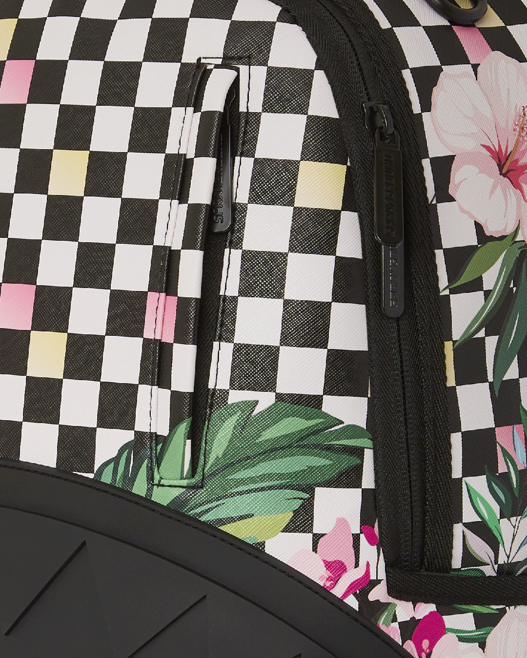 Open backpack showing velour laptop sleeve and organizer pockets