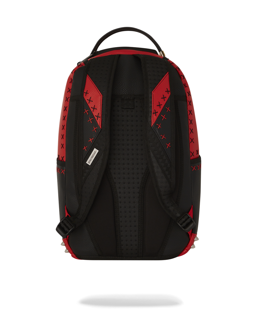Urban Explorer backpack showcasing faux leather texture and metallic details.