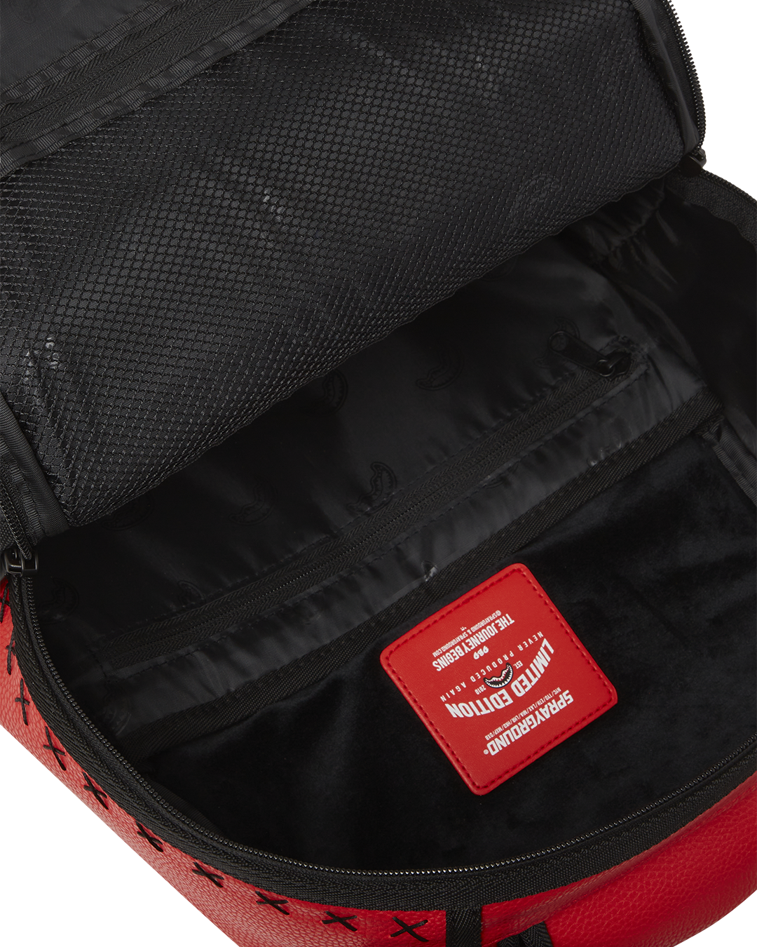 Interior view of the travelers backpack with laptop compartment and organizers.