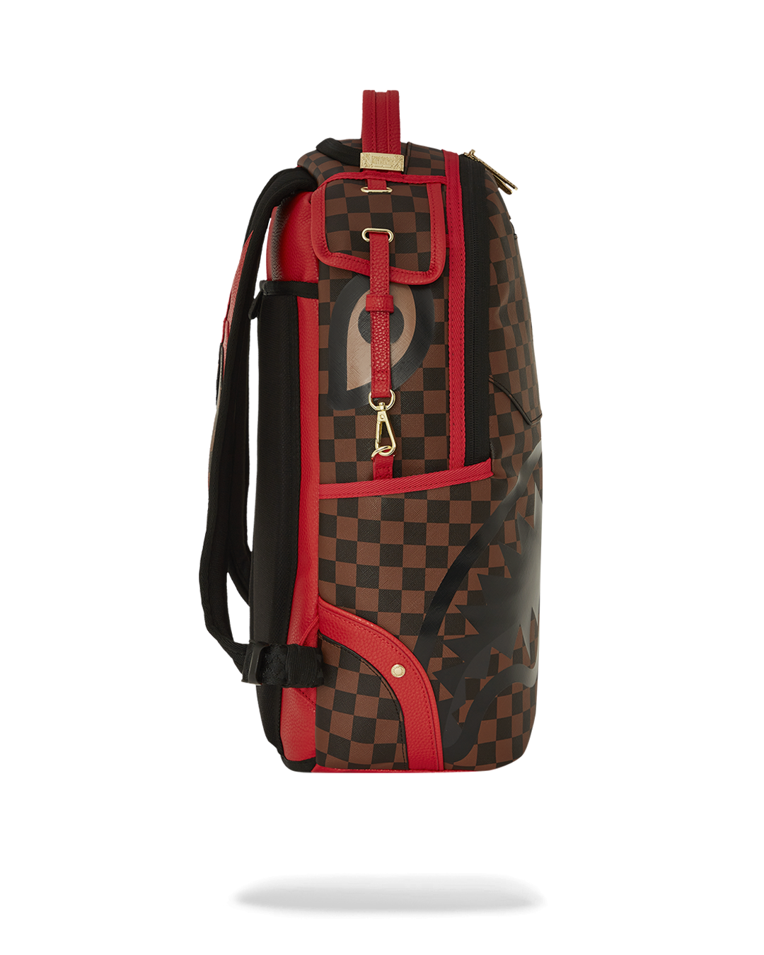 Backpack worn crossbody in a city setting, showcasing its sleek profile