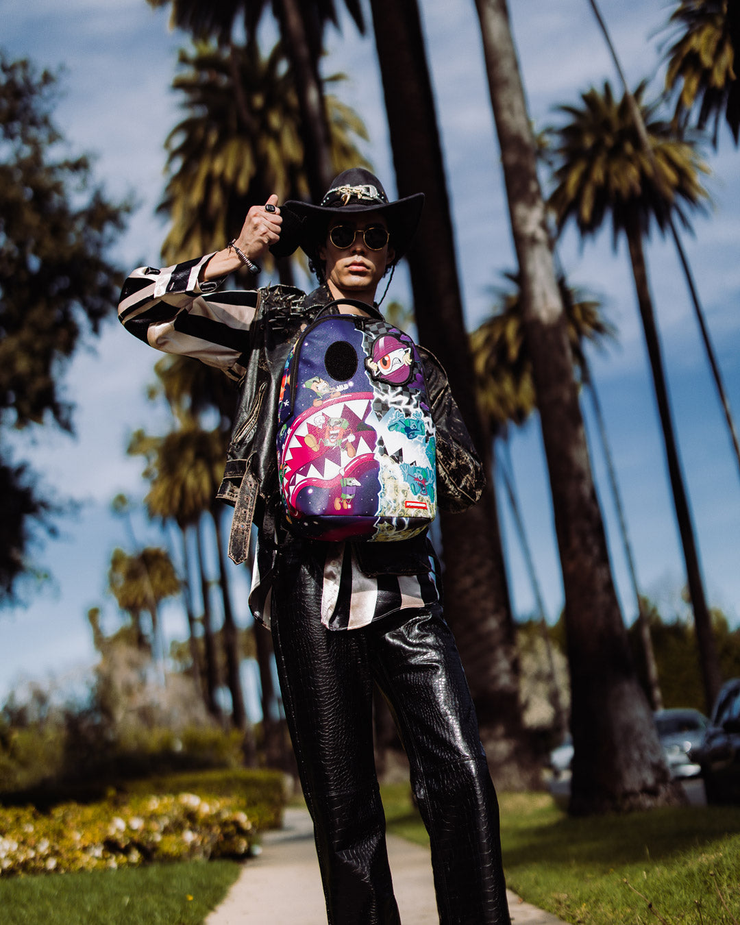 Water-Resistant Backpack with gold zippers and metal Sprayground Authentic badge