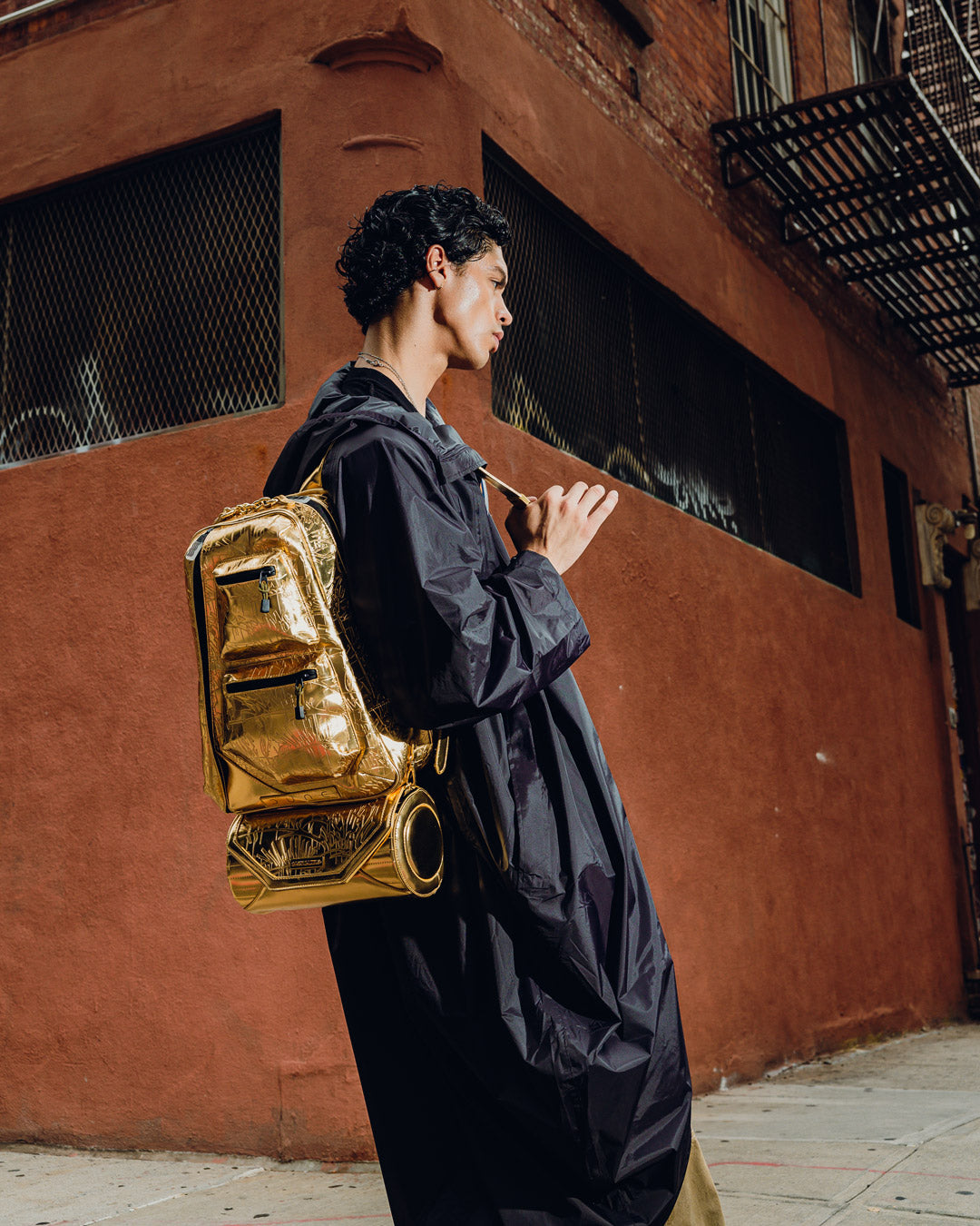 Versatile Dune crossbody bag displayed in an urban setting.