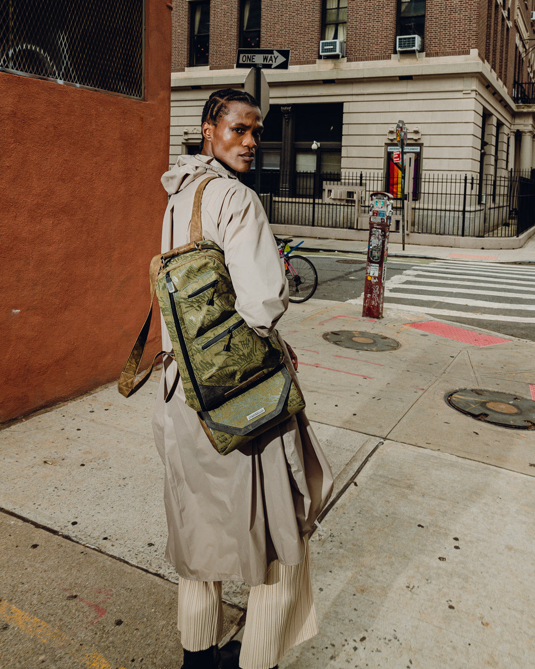 Crossbody bag detached from backpack, styled for urban daywear