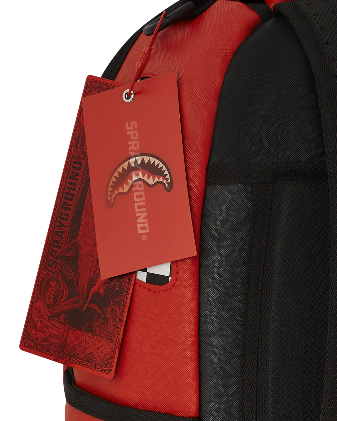 Backpack strapped to rolling luggage, demonstrating travel convenience