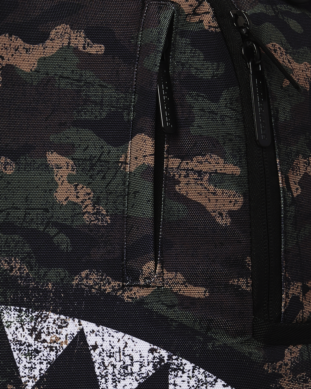 Front view of Sprayground DLXSR backpack with pink fade and gold hardware