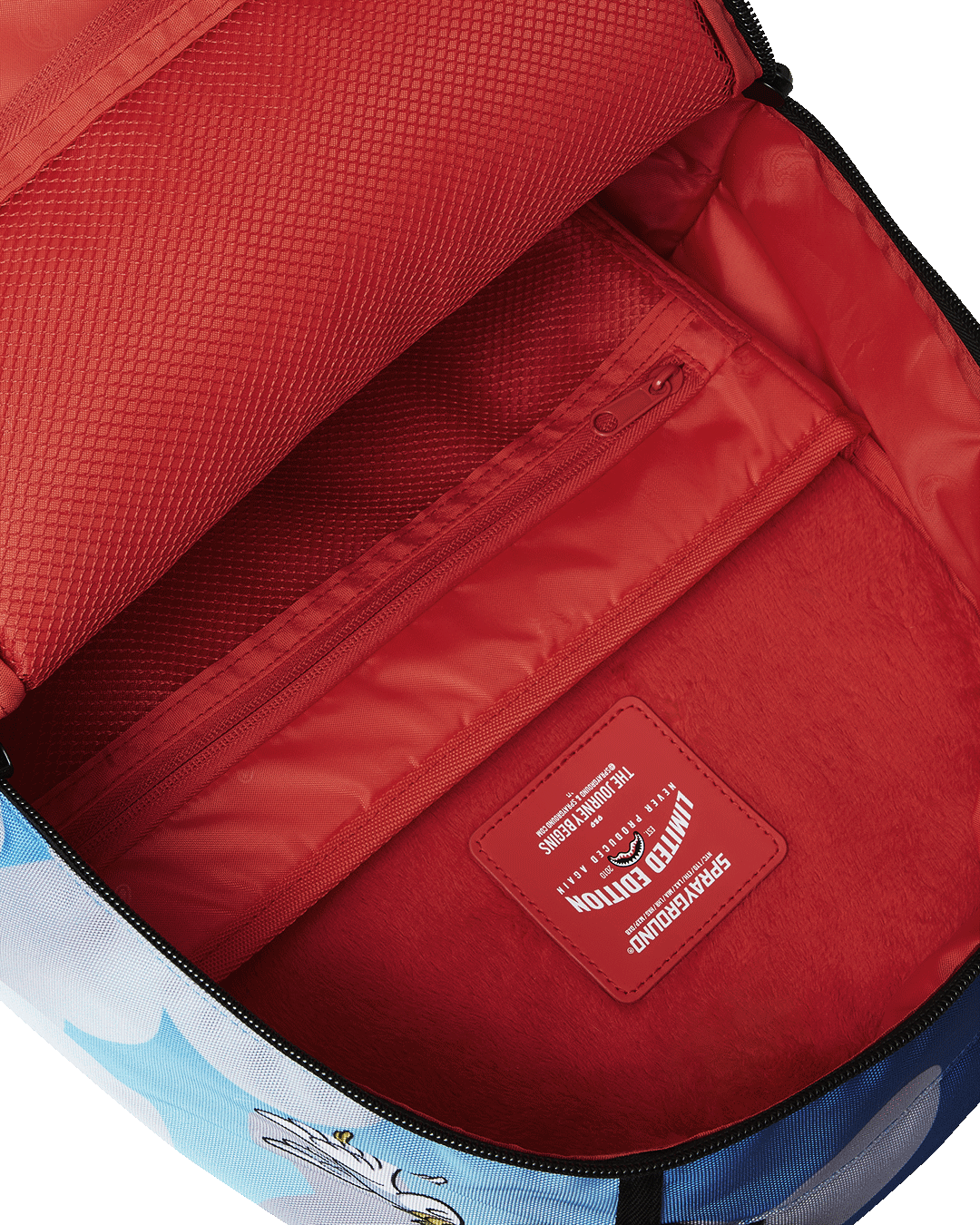 Clear Sprayground backpack with visible contents, showcasing organized storage and durability