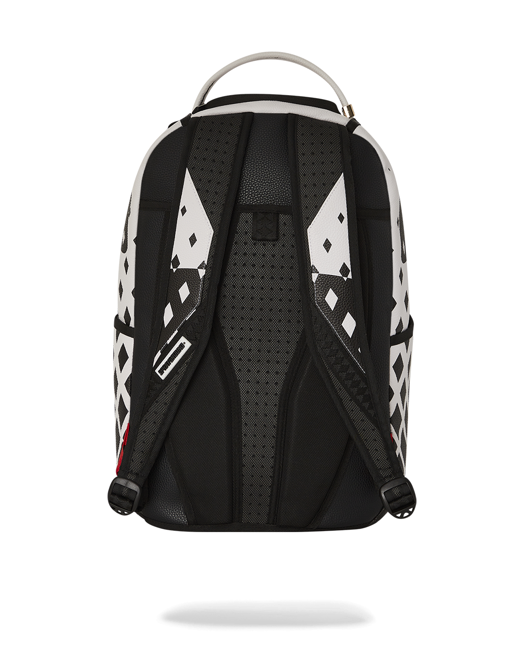 DLXV faux leather backpack worn casually over one shoulder in urban setting