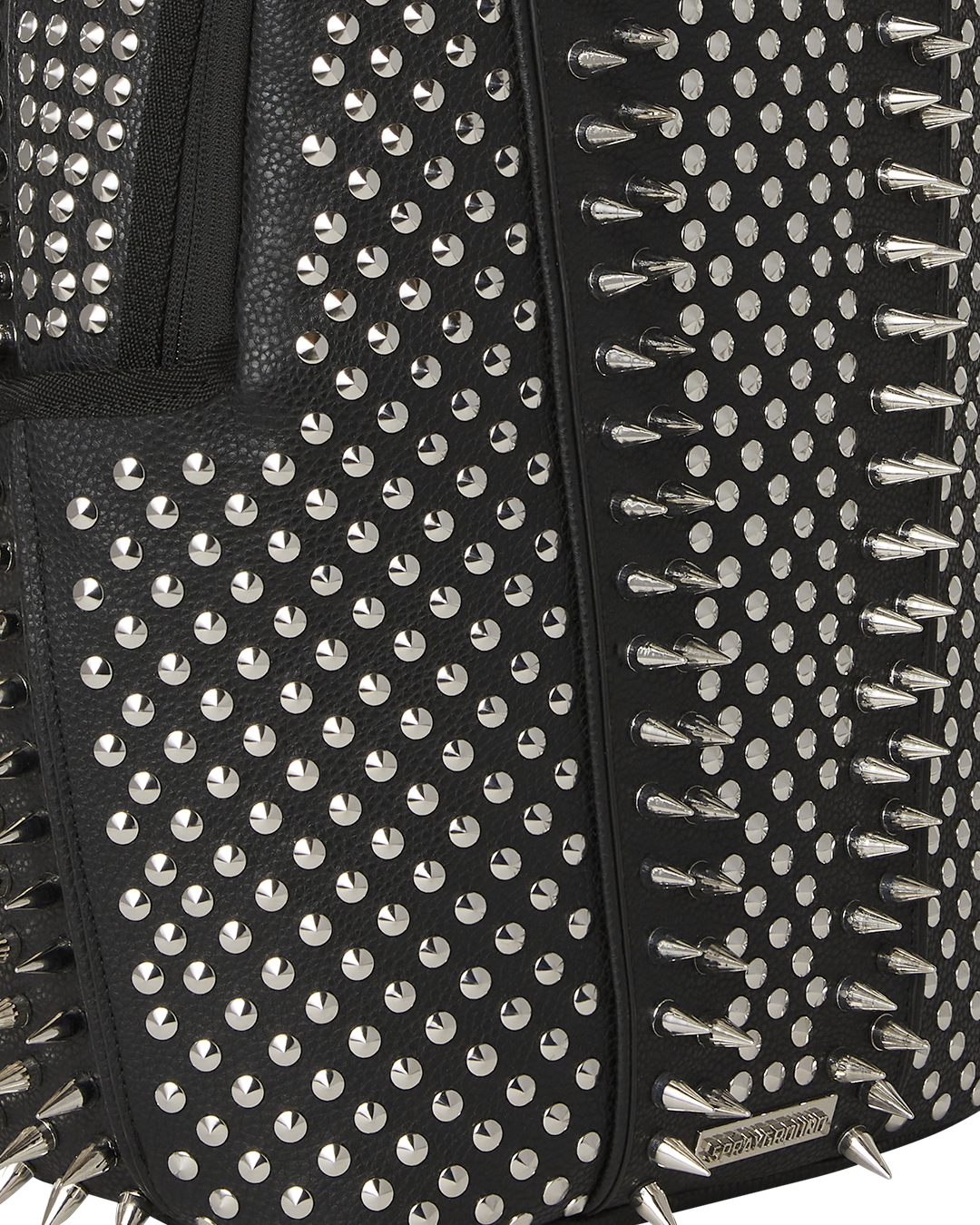 Side angle of the limited edition Sprayground backpack showcasing pockets.