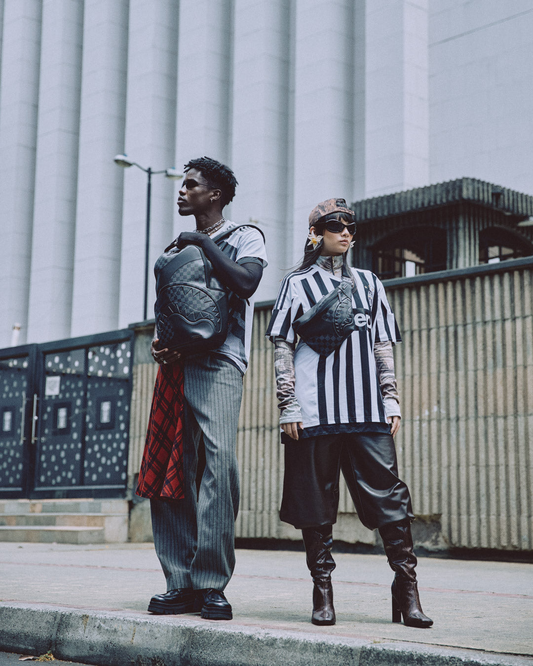 Ghost Wave backpack worn crossbody in a city setting, showcasing its compact profile