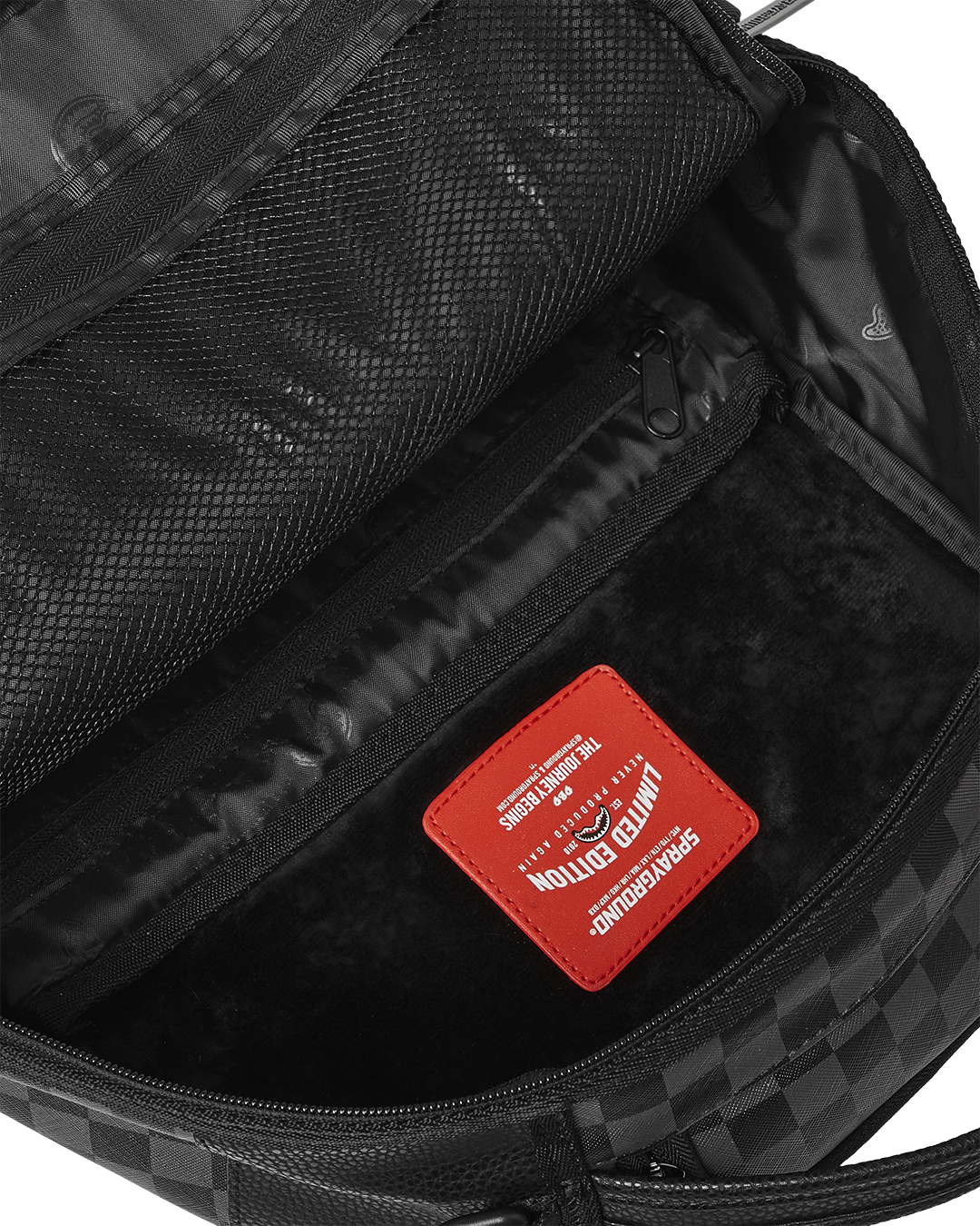 Ghost Wave backpack worn crossbody in a city setting, showcasing its compact profile