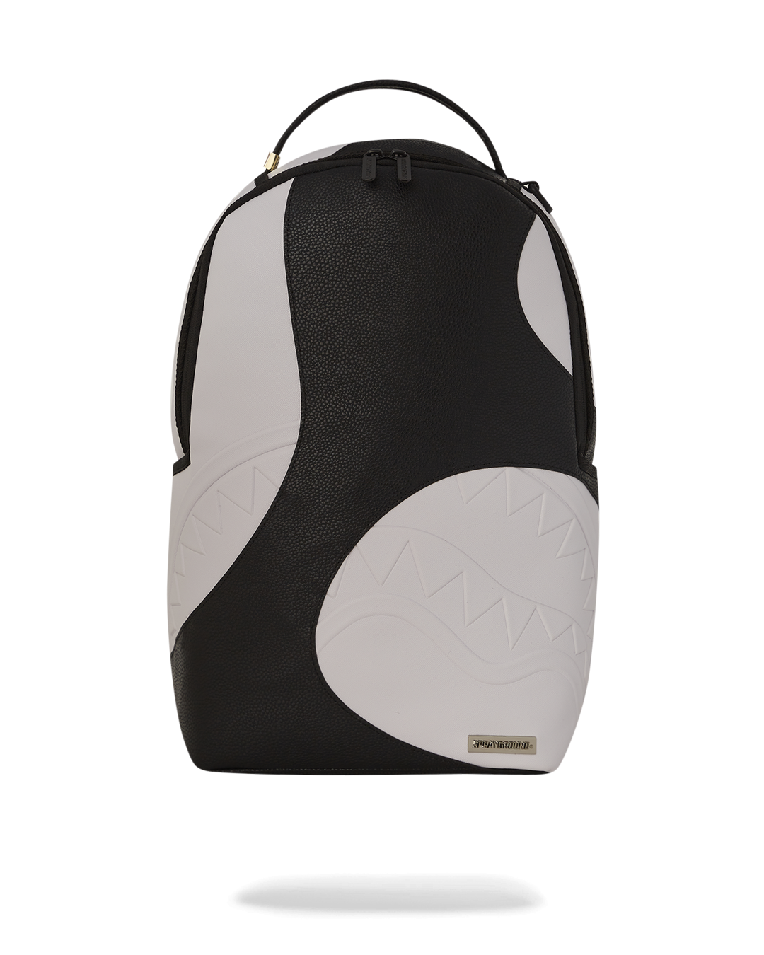 Front view of faux leather backpack showing gold zippers and badge