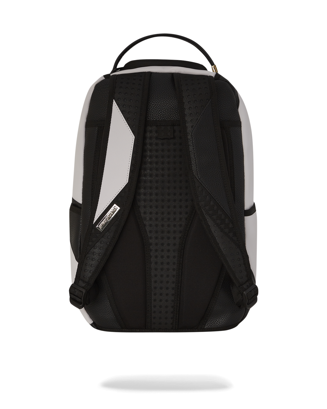 Front view of faux leather backpack showing gold zippers and badge