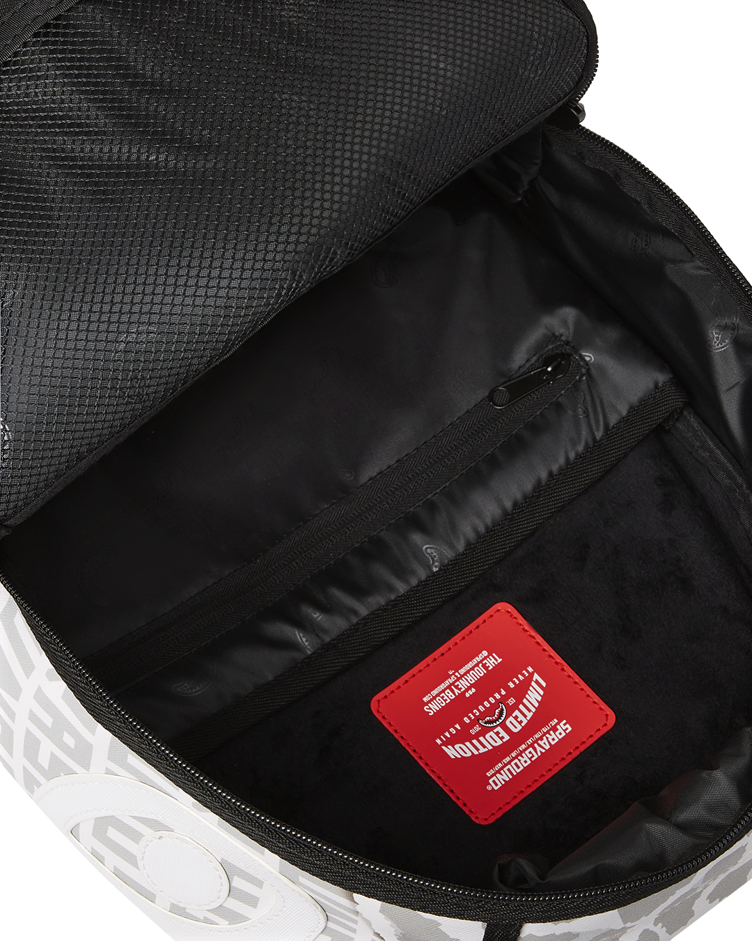 Front view of faux leather backpack with gold zippers and ergonomic straps