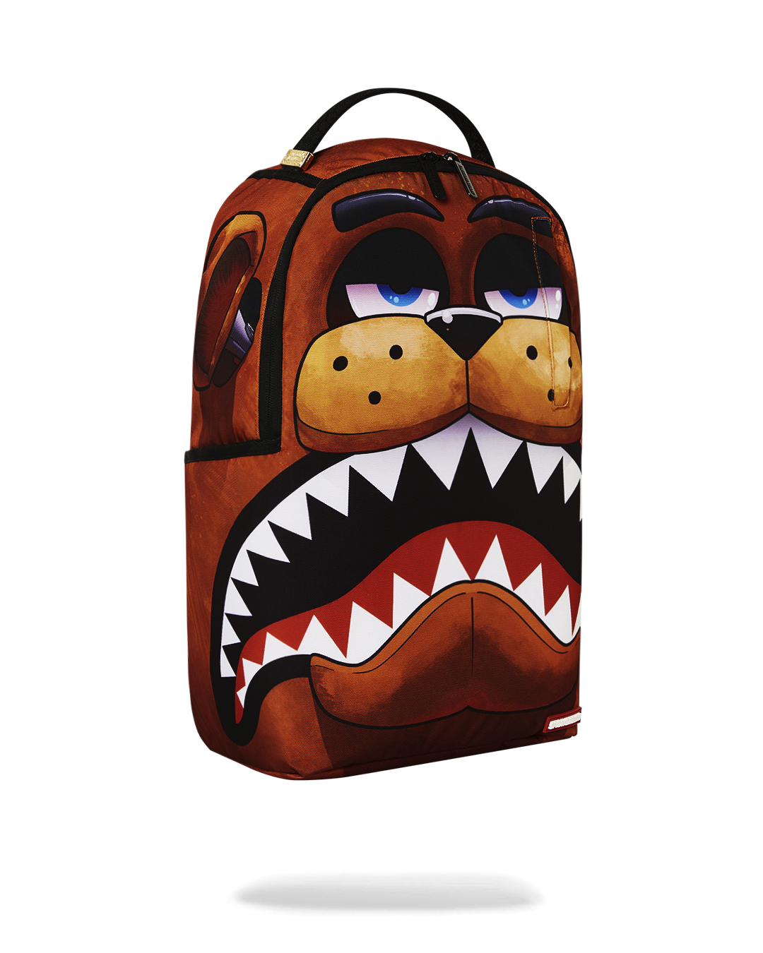 Sprayground Freddy Shark Backpack being used by a gamer at a desk
