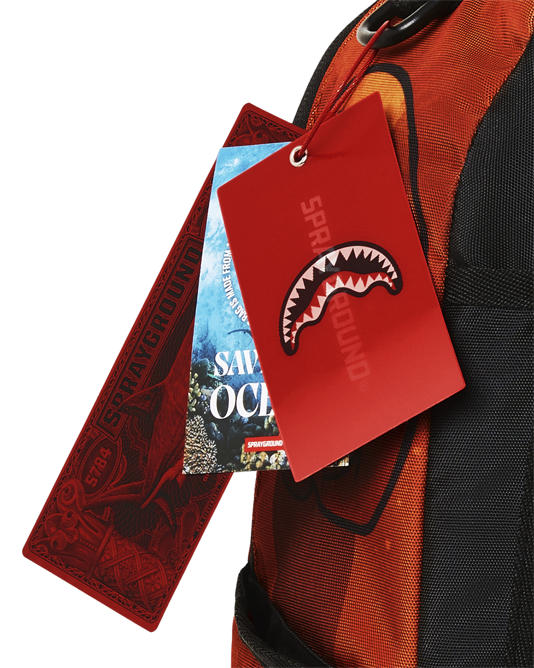 Sprayground Freddy Shark Backpack being used by a gamer at a desk
