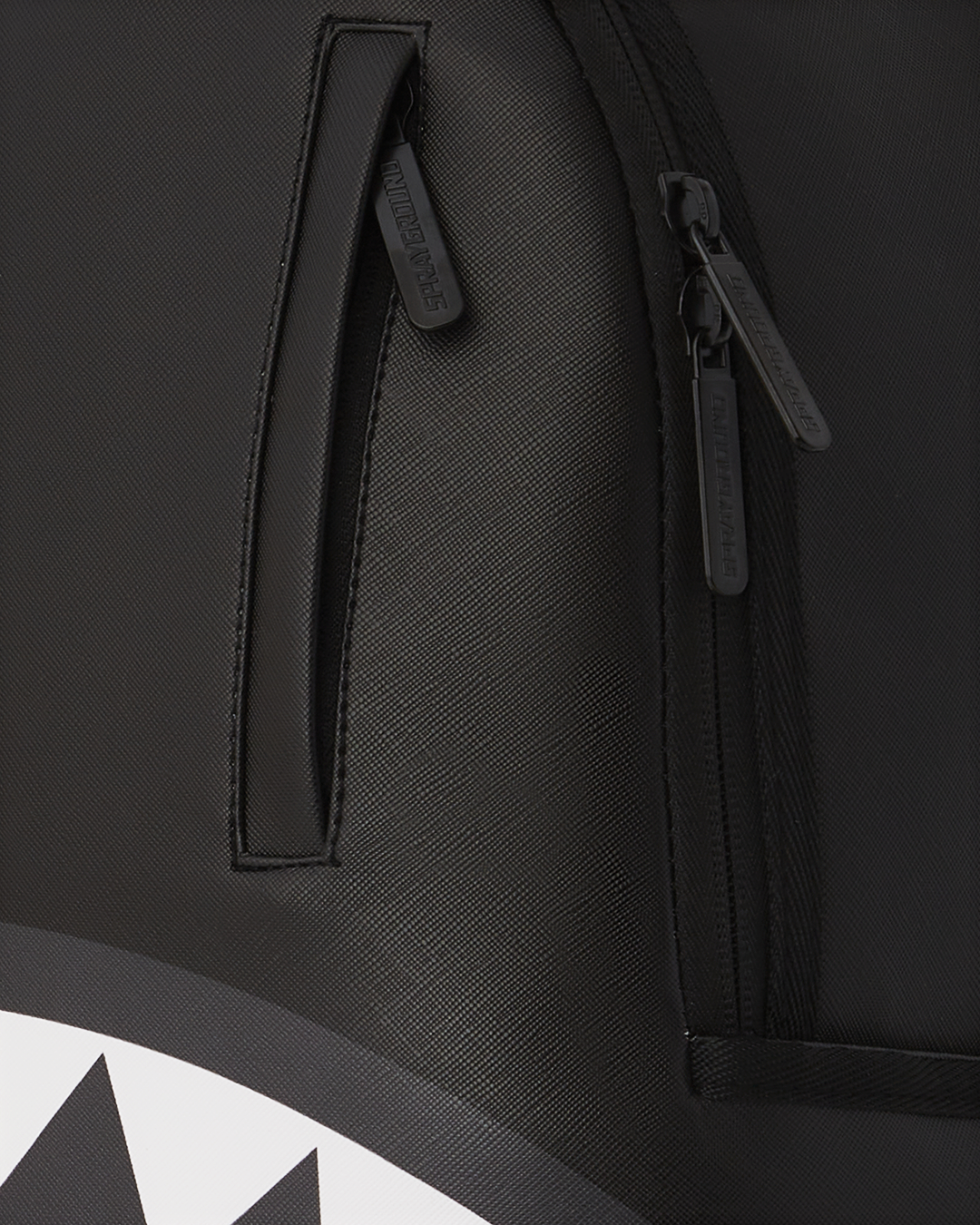 Front view of faux leather backpack with gold hardware and branded badge