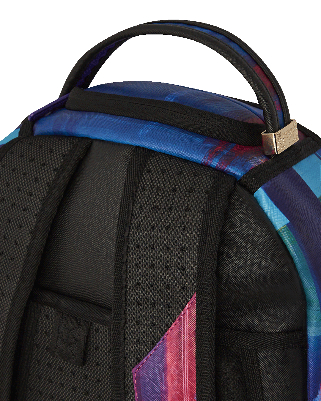 Close-up of the faux leather exterior with gold zippers and metal hardware