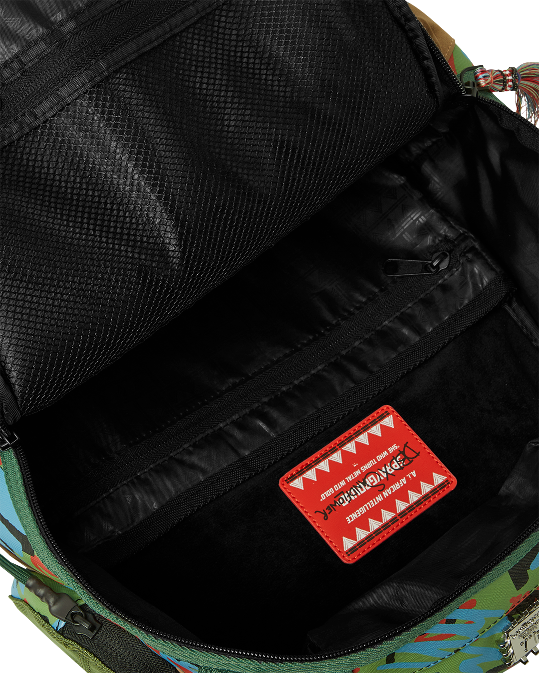 Side profile of the clear Sprayground backpack showing adjustable straps and pockets