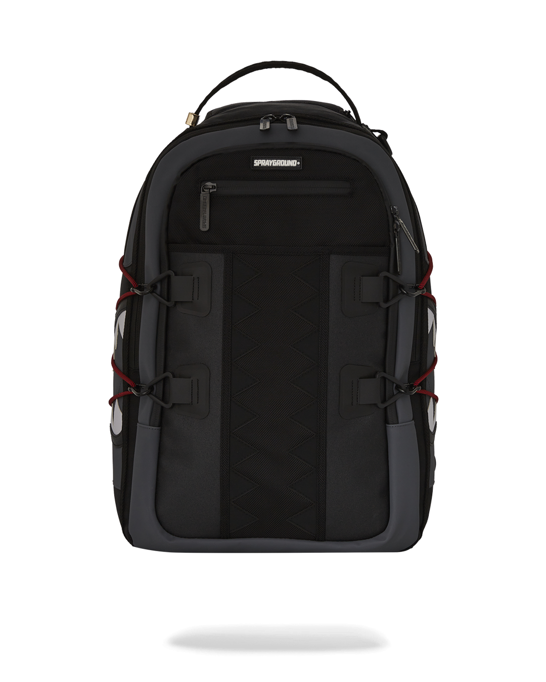 Front view of the travel backpack showing dual zipper pockets and signature rubber detailing