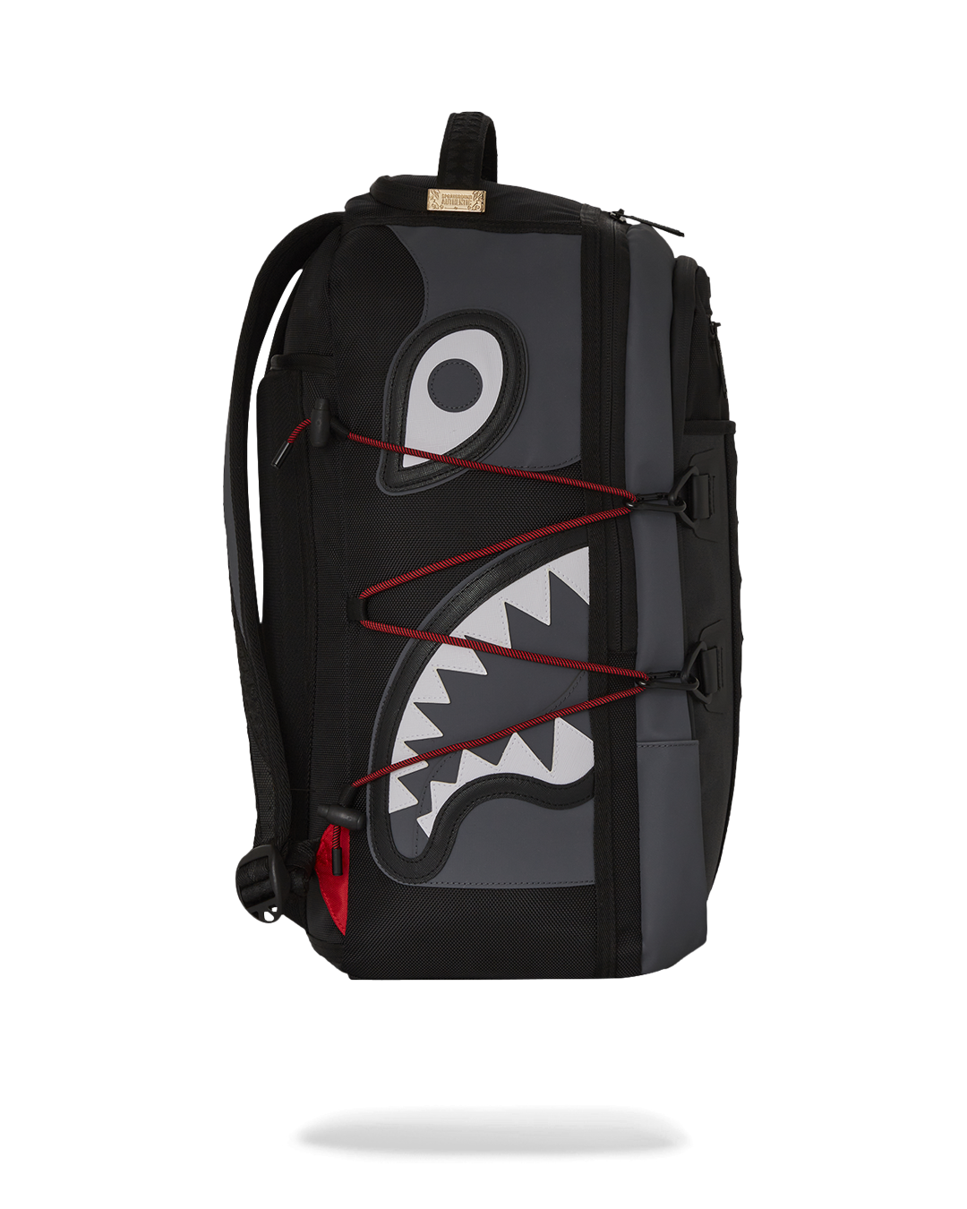 Backpack attached to rolling luggage, highlighting travel-friendly features
