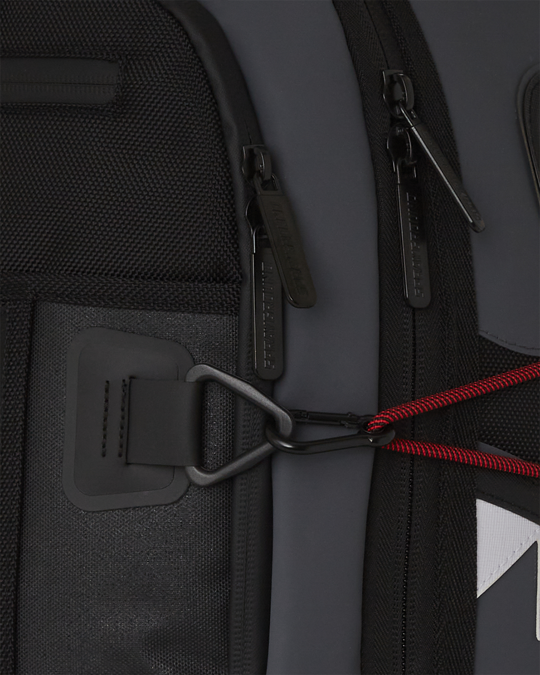 Backpack attached to rolling luggage, highlighting travel-friendly features