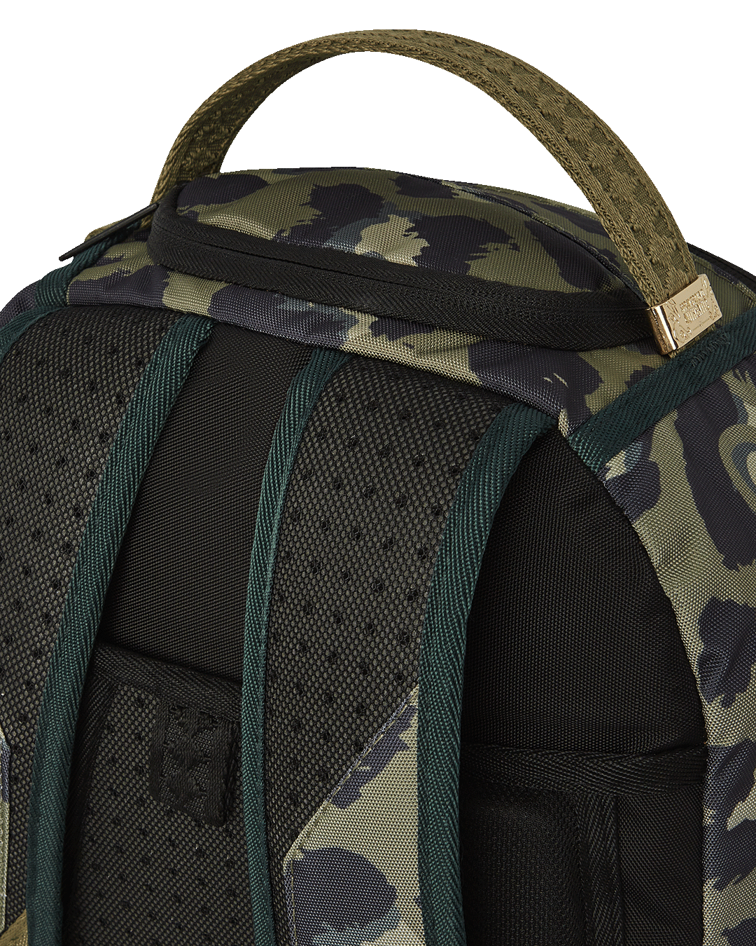 Back sleeve of backpack attached to a rolling suitcase in airport