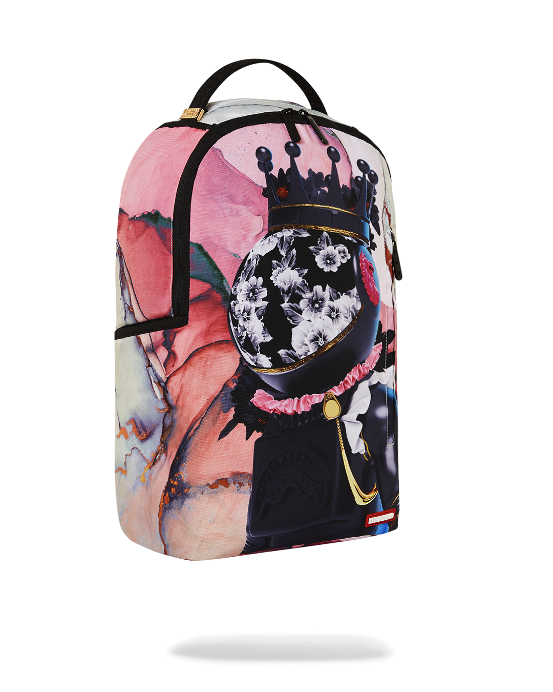 Backpack attached to luggage via slide-through sleeve