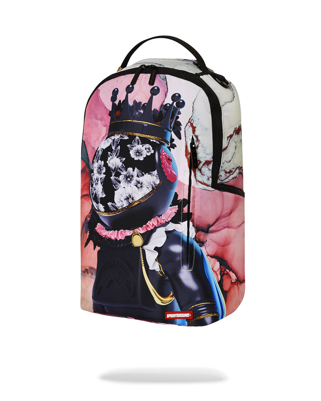 Backpack attached to luggage via slide-through sleeve